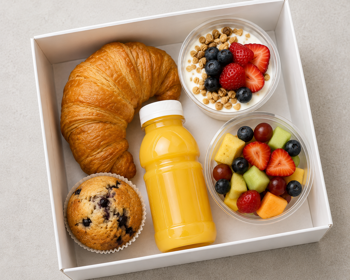 Sunday brunch board filled with croissants, danishes, pastries and jams